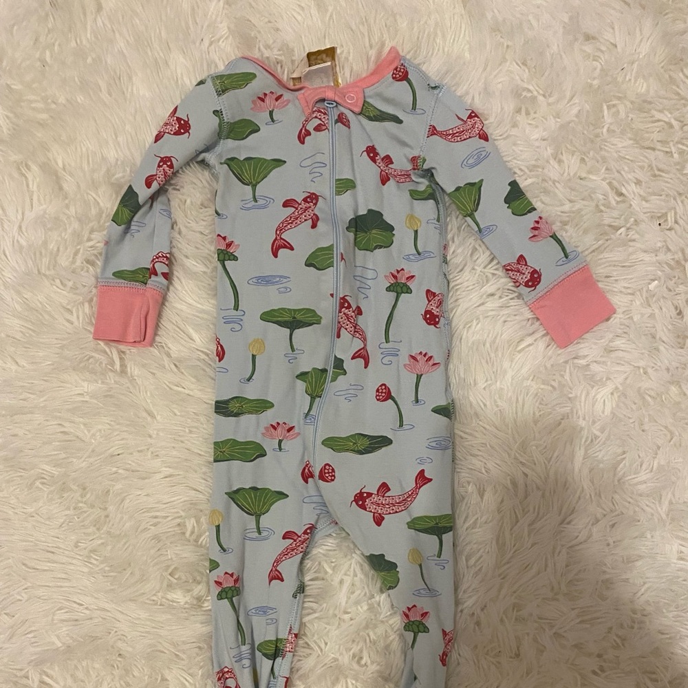 Never worn by Walker. Footed pajamas. No holes, stains, never dried